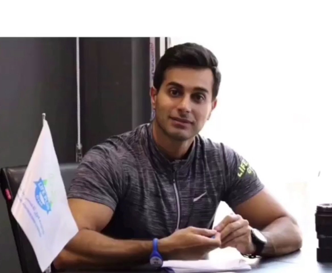 Mah Ghasemi at his desk